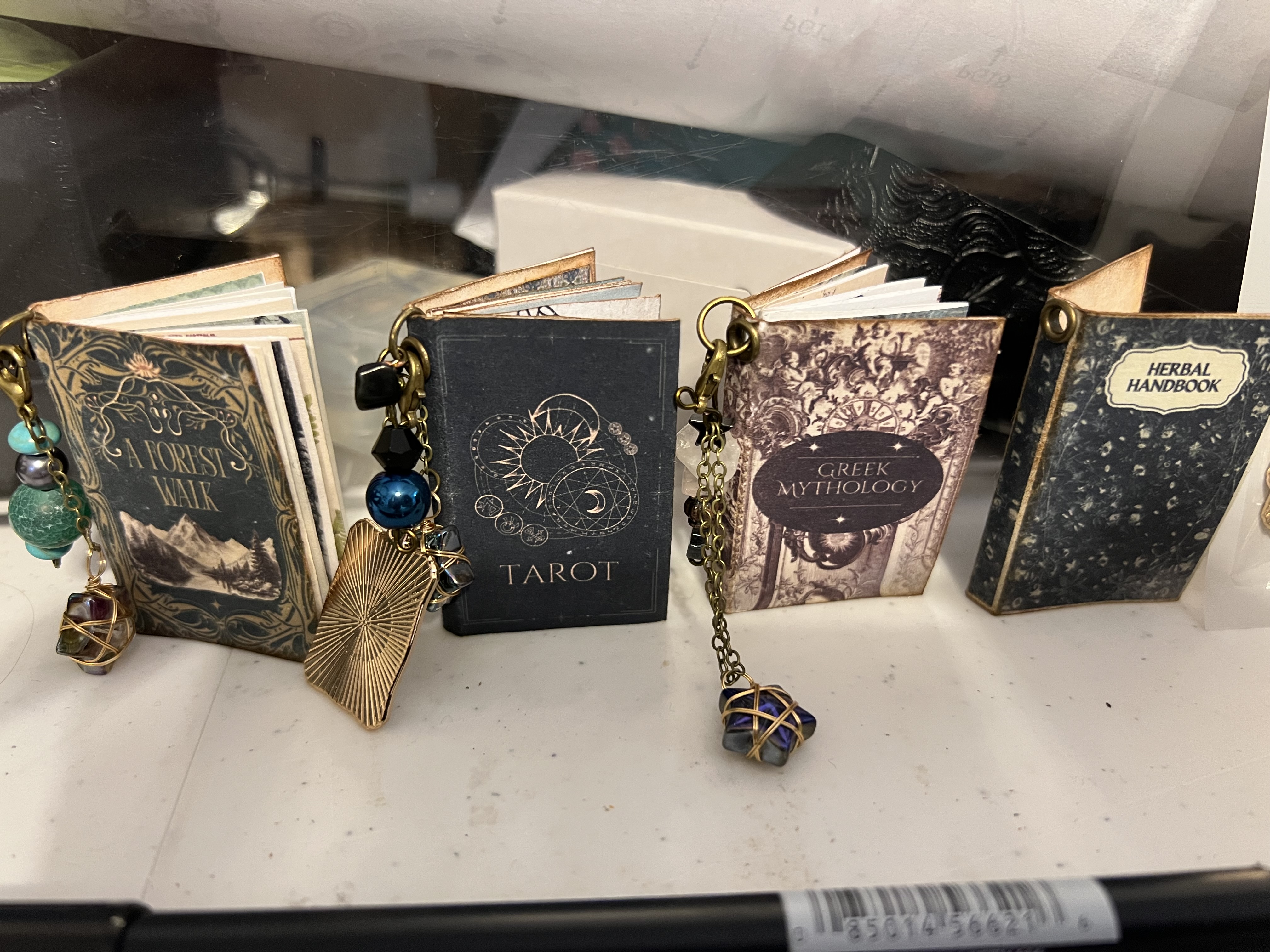 Handmade miniature book charms with beaded chains — Tarot, Greek Mythology, and more