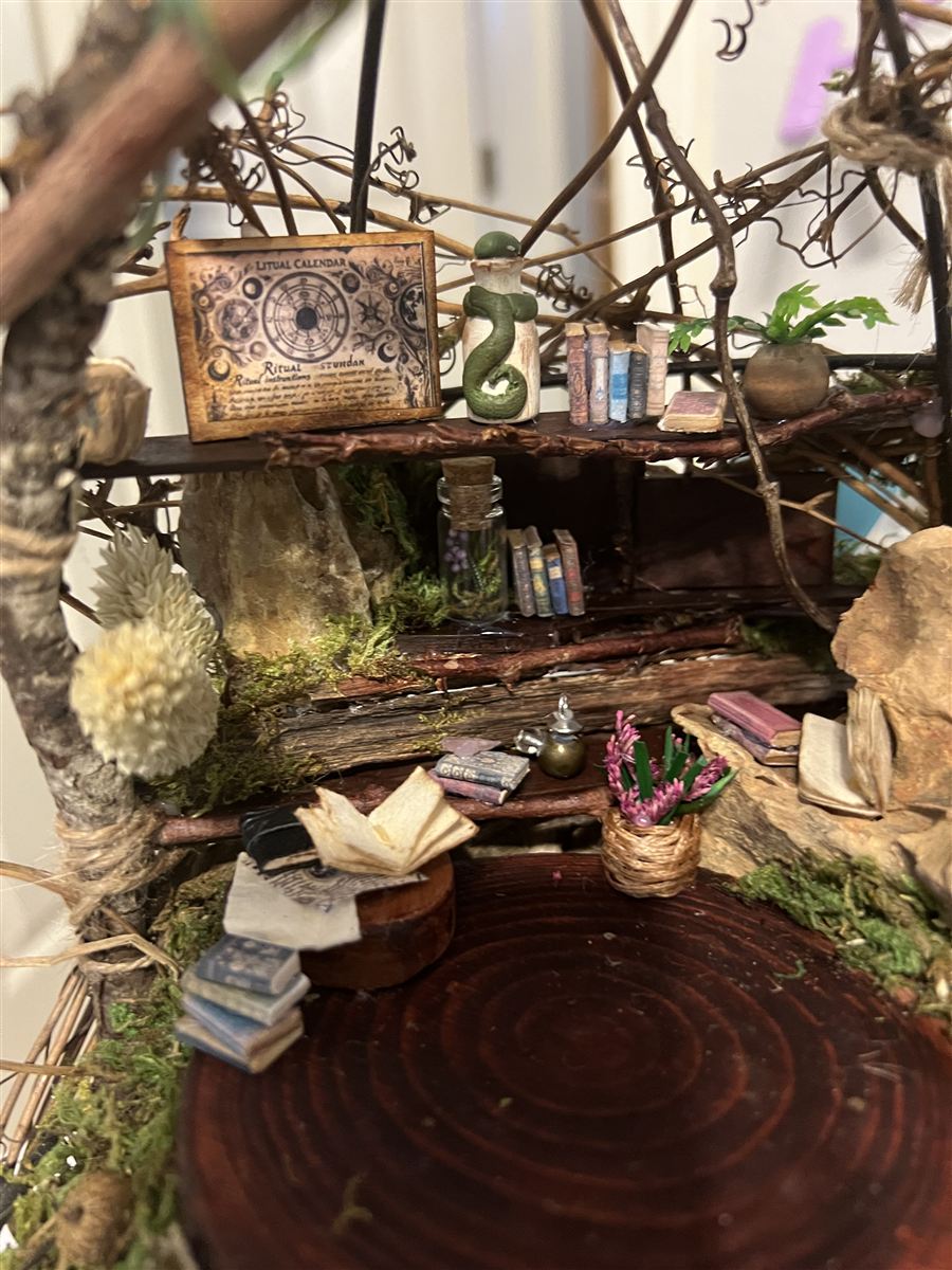 Handmade fairy library — a tiny magical bookshelf scene