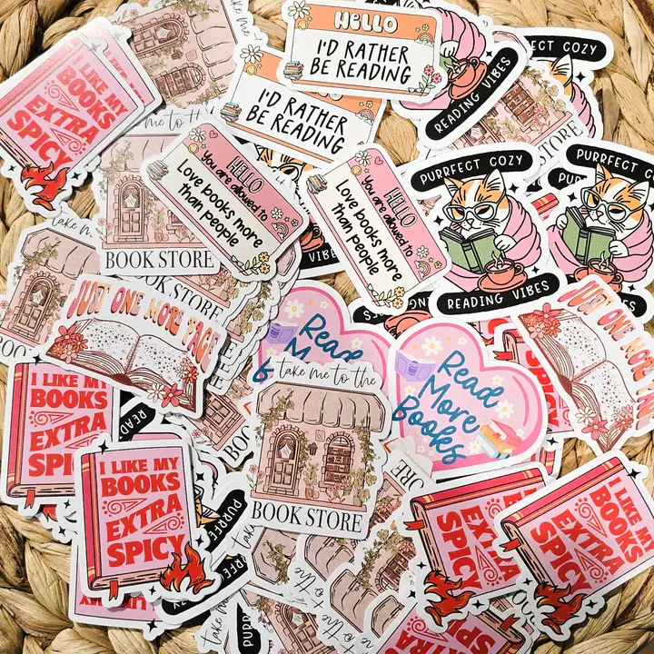 Colorful bookish stickers spread — I Like My Books Extra Spicy, Book Store, and more